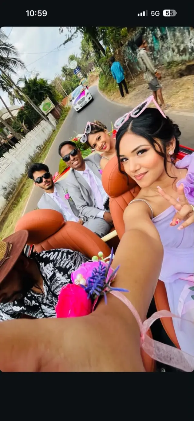 Bridal party in convertible car — full glam