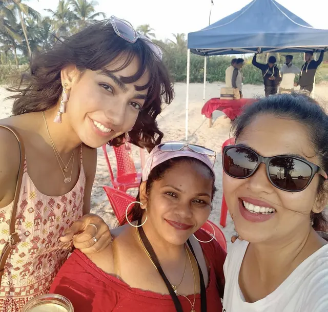 Mehreen with clients on a beach shoot in Goa