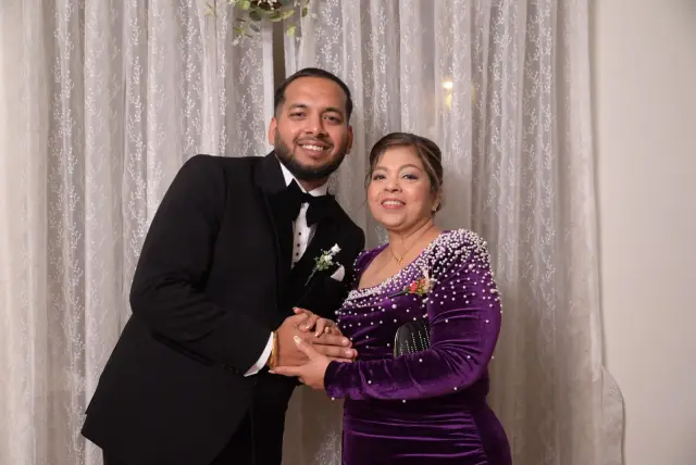 Occasion makeup and hair in purple velvet pearl gown